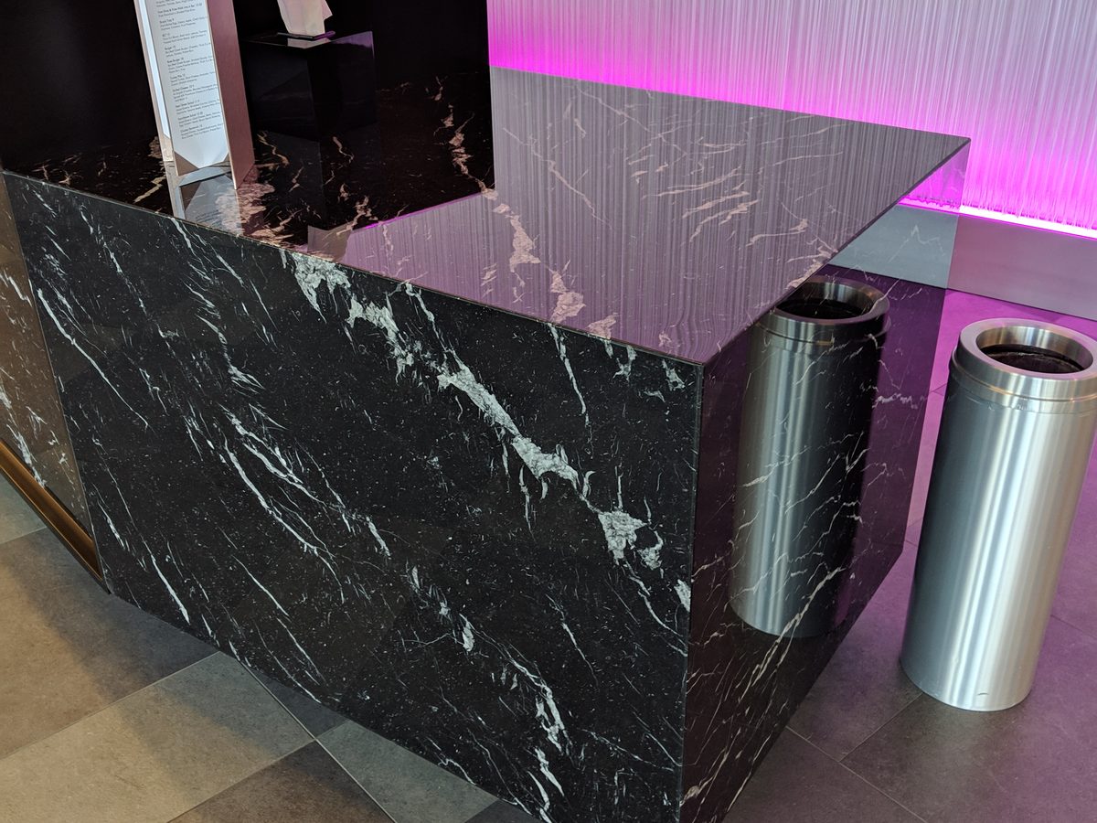 Black marble waterfall edge with Tuffskin gloss protection