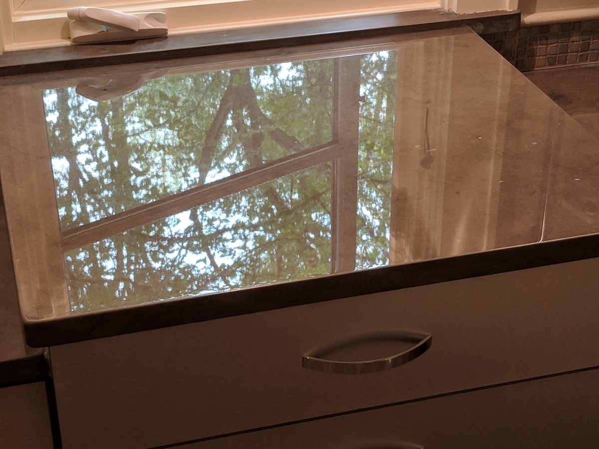 Powder room marble vanity with Tuffskin gloss