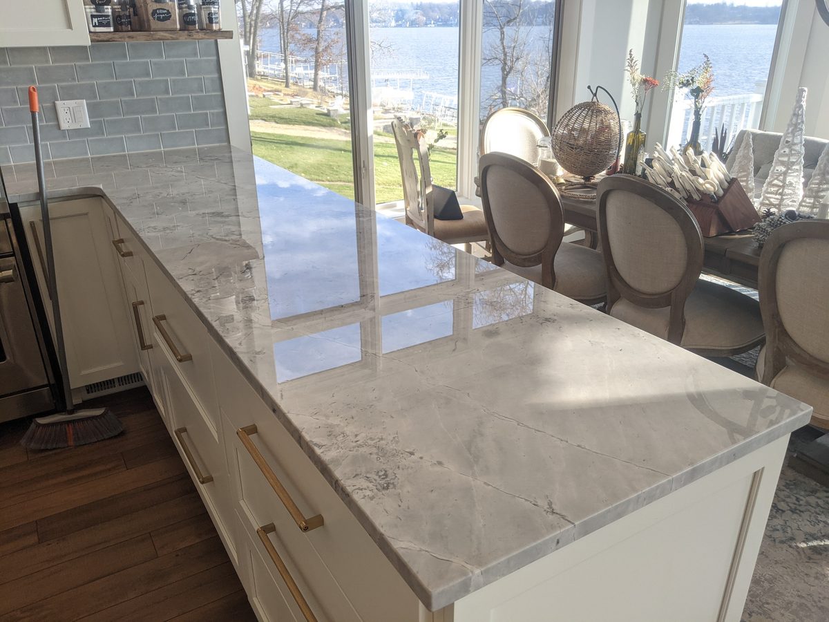 Residential lakefront kitchen with Tuffskin gloss on marble countertop