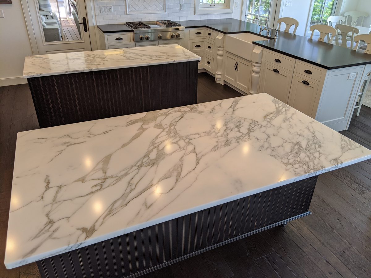 Residential kitchen twin marble islands with Tuffskin satin finish
